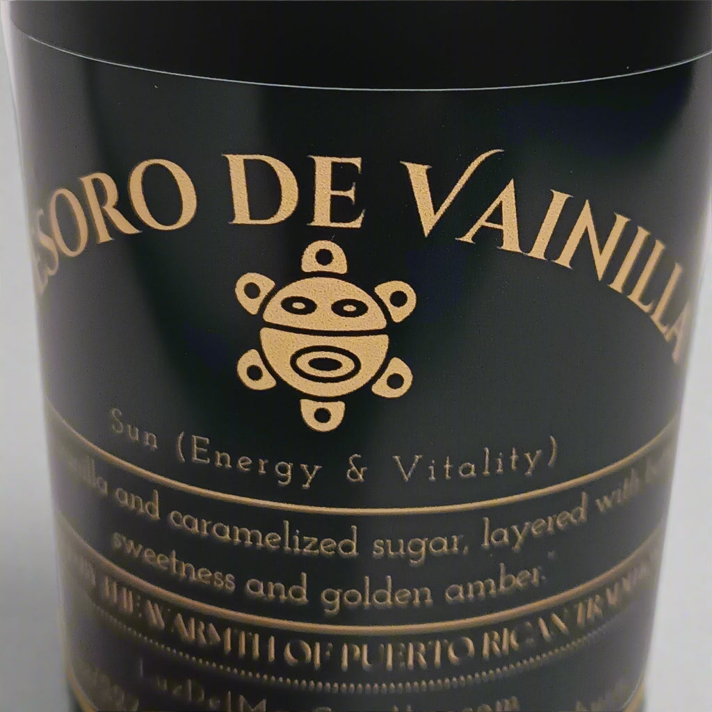 tesoro-de-vainilla-warm-vanilla-candle close up of the "del Sol" (Taino sun pictograph) a symbol of Energy and Vitality